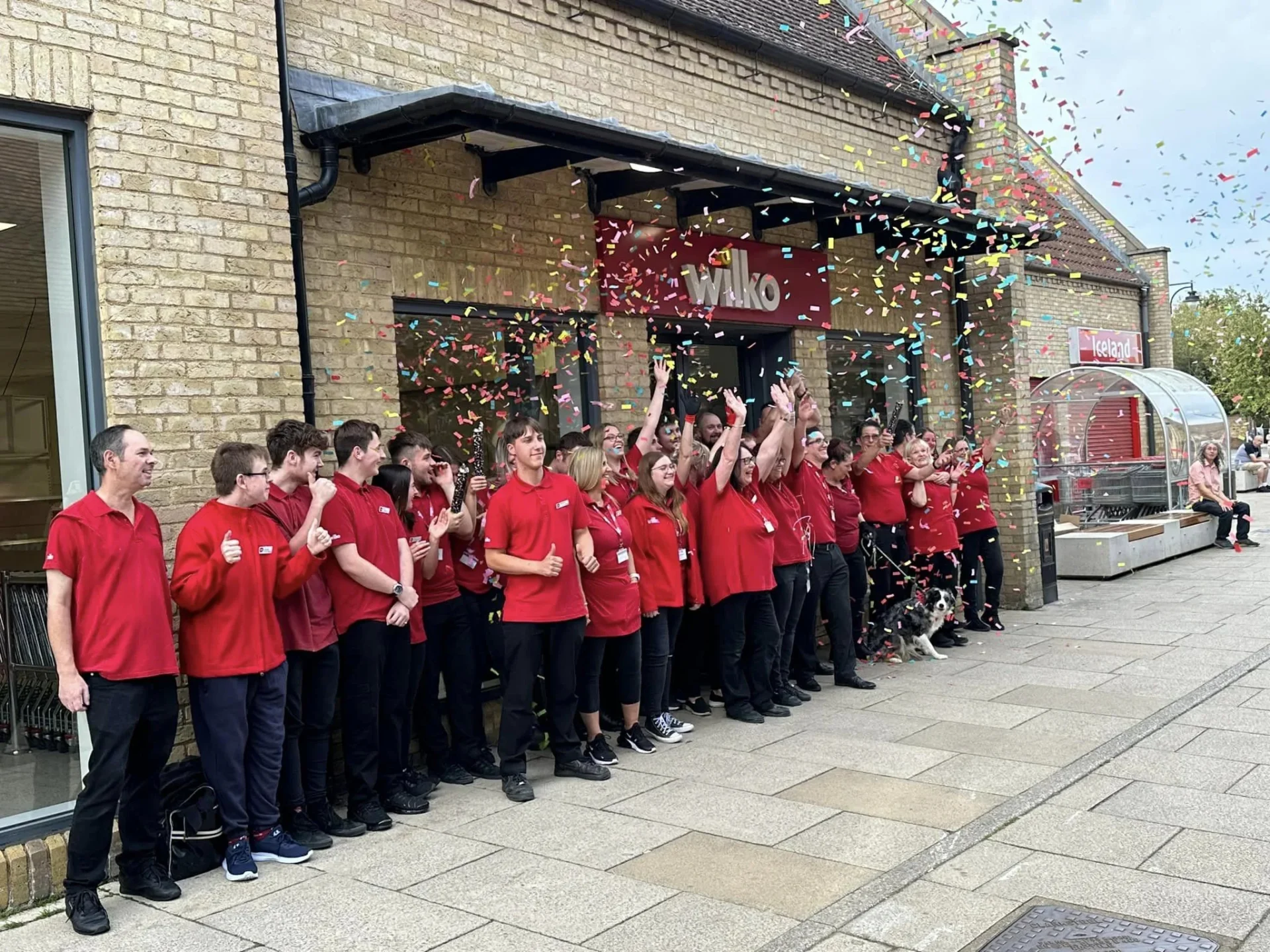 wilko staff gather outside 2 - News for Peterborough and Cambridgeshire News for Peterborough and Cambridgeshire - Wilko staff past and present outside Wilko in Ely at 4pm on Sunday as the doors closed for the last time.