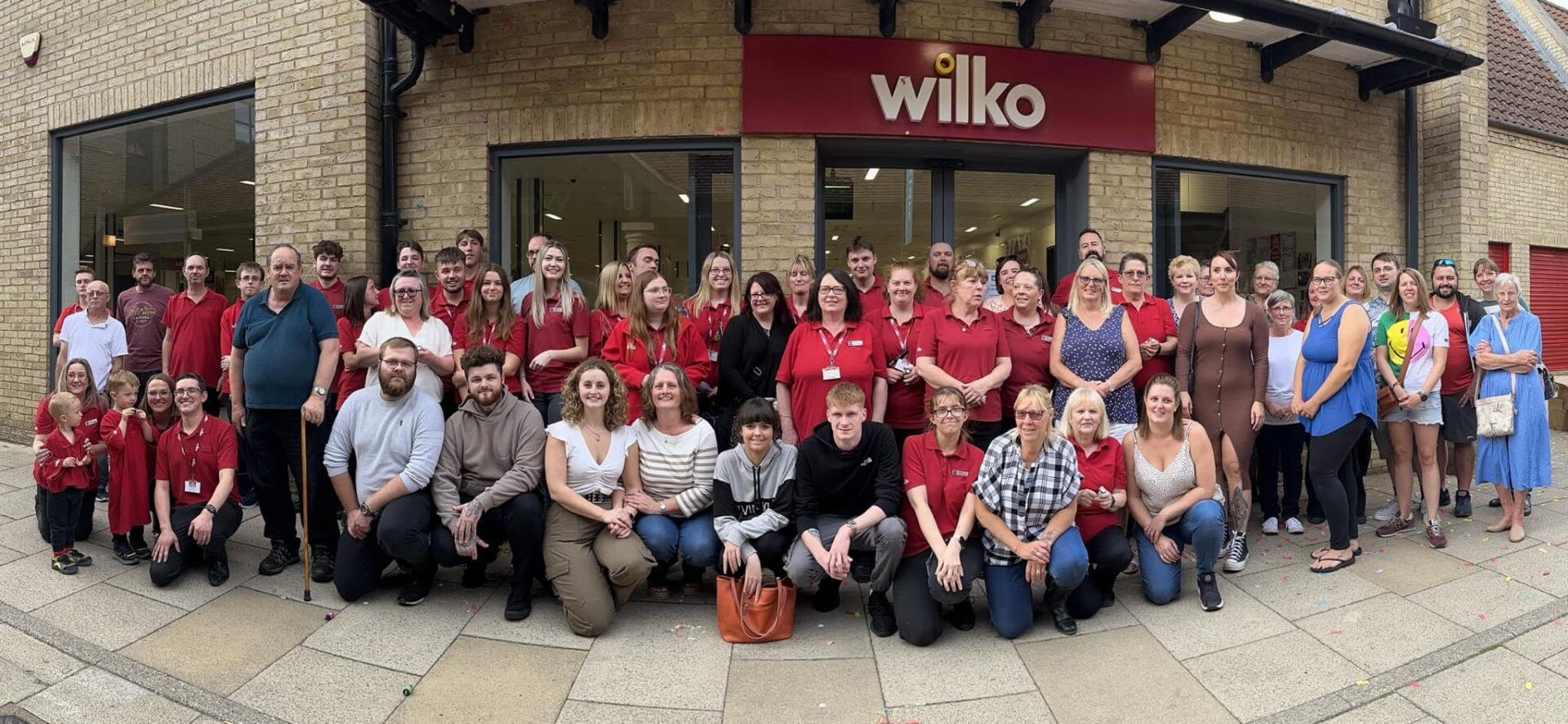 wilko staff past and present.jpg 2 - News for Peterborough and Cambridgeshire News for Peterborough and Cambridgeshire - Wilko staff past and present outside Wilko in Ely at 4pm on Sunday as the doors closed for the last time.