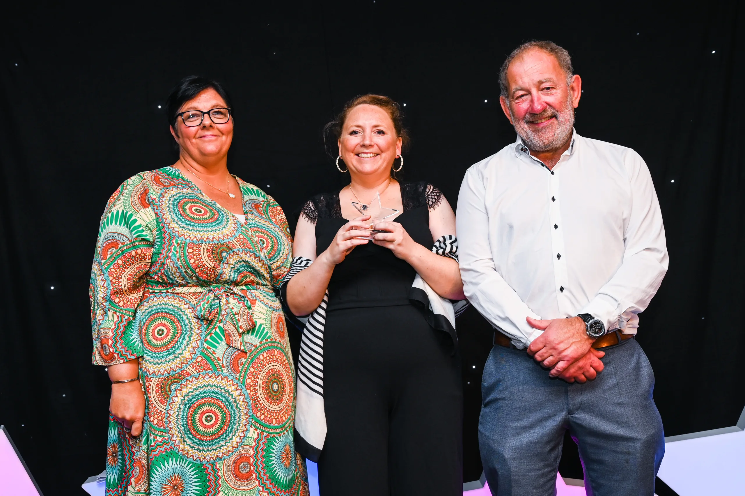 Pictured here L to R: Claire Peart, National Dementia Lead for Barchester, award winner Jo Lawn, National Dementia Champion and Barchester CEO, Dr Pete Calveley