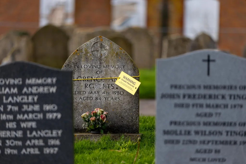 Residents in Terrington St Clement say health and safety has “gone mad” after their local council placed yellow warning tags on gravestones. PHOTO: Terry Harris