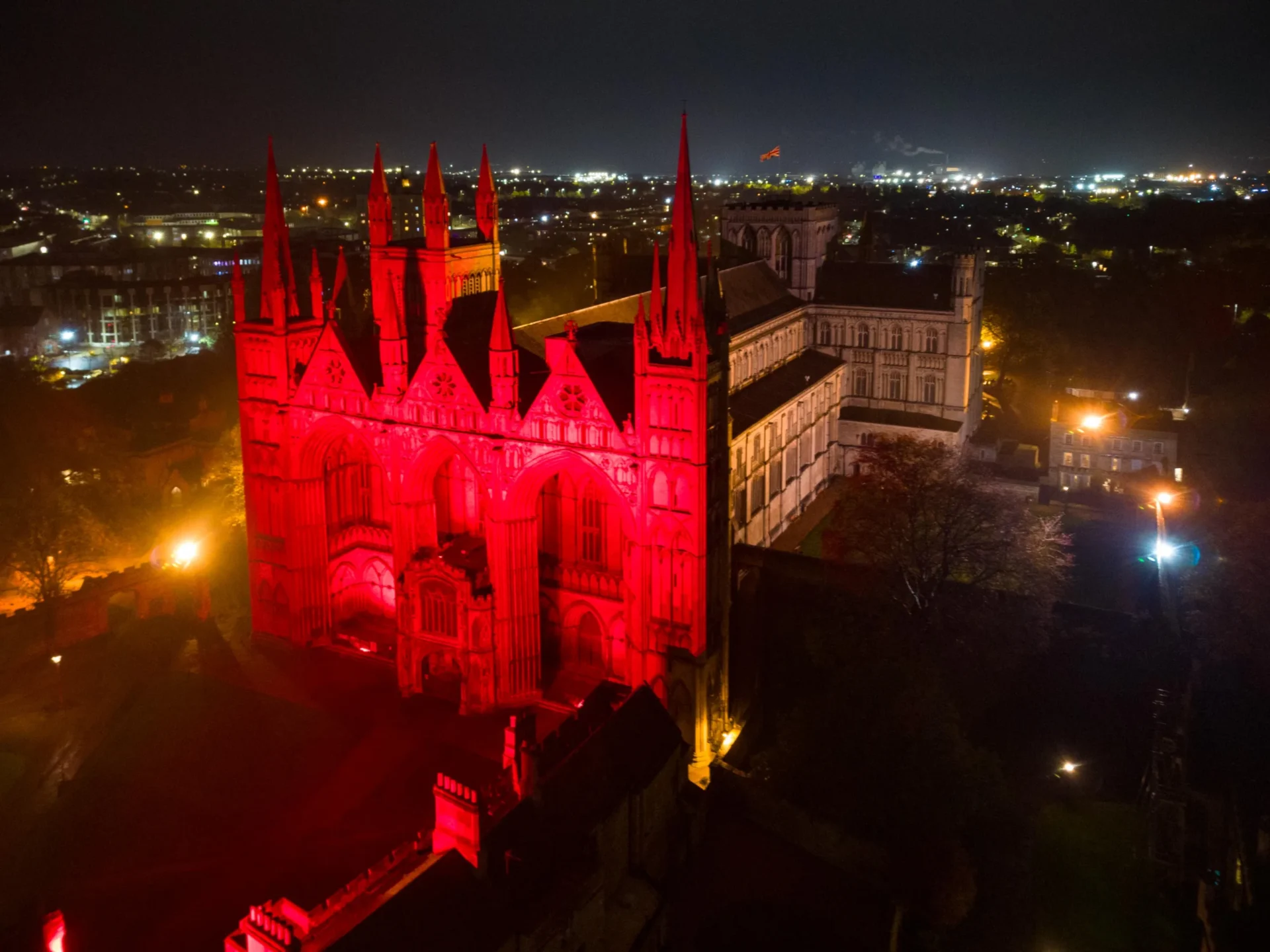 Peterborough Cathedral Lit Red for  Remembrance Sunday - News for Peterborough and Cambridgeshire News for Peterborough and Cambridgeshire - The Cathedral in red for Remembrance Sunday....