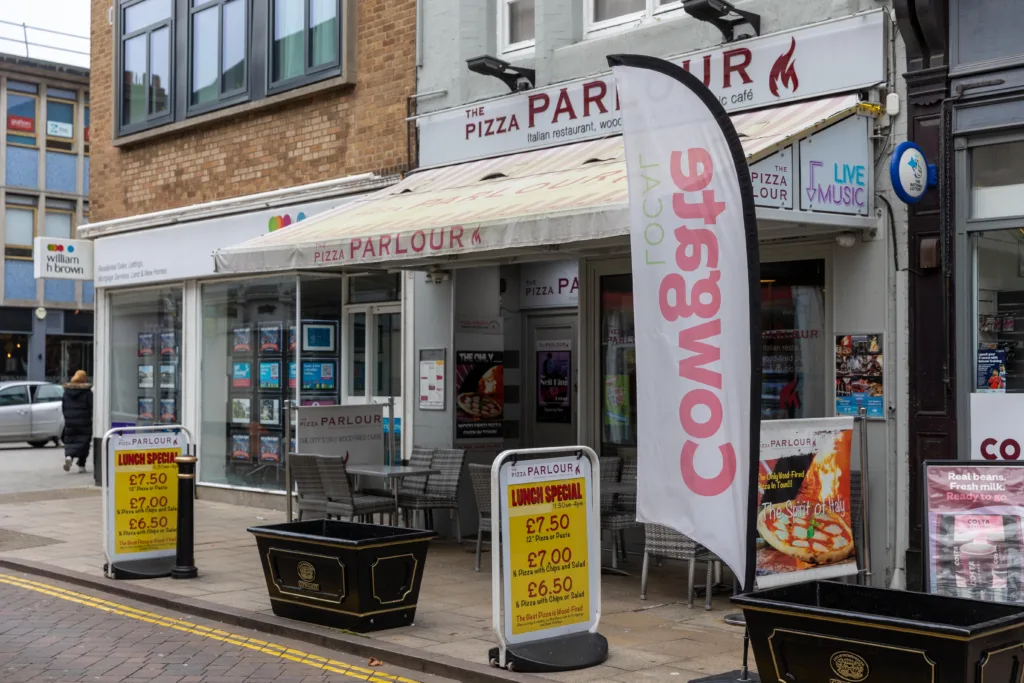 Pizza Parlour. - News for Peterborough and Cambridgeshire 572 people signed a petition to the city council saying that “e the customers of the Pizza Parlour and Music Café submit this petition to support for the construction of the new fixed canopy outside of the restaurant to allow customers to enjoy outside dining”. But the fixed canopy has lost its final battle with planners. PHOTO: Terry Harris