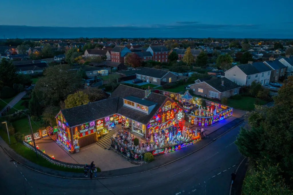 John and Helen Attesley have again turned their Soham home into a Christmas lights eye catcher: not long after the switch on, Soham Town Rangers held a fantastic fireworks display. PHOTO: Terry Harris for CambsNews 