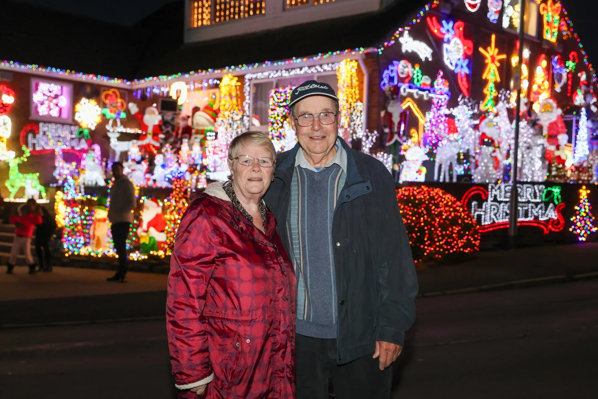 News for Peterborough and Cambridgeshire - John and Helen Attesley have again turned their Soham home into a Christmas lights eye catcher: not long after the switch on, Soham Town Rangers held a fantastic fireworks display. PHOTO: Terry Harris for CambsNews