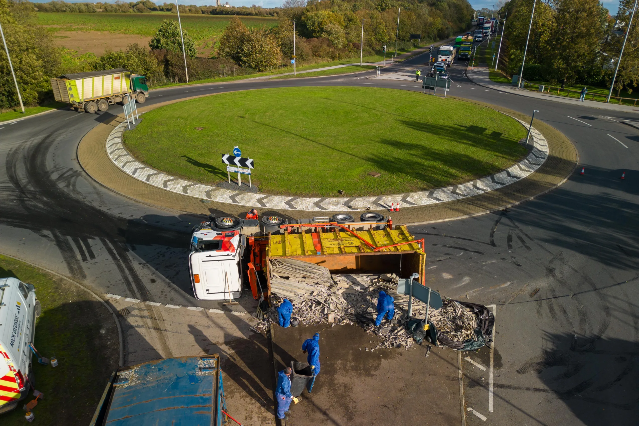 The scene at Witchford roundabout today as recovery takes place of the contents of a lorry that shed its load. PHOTO: Terry Harris for CambsNews