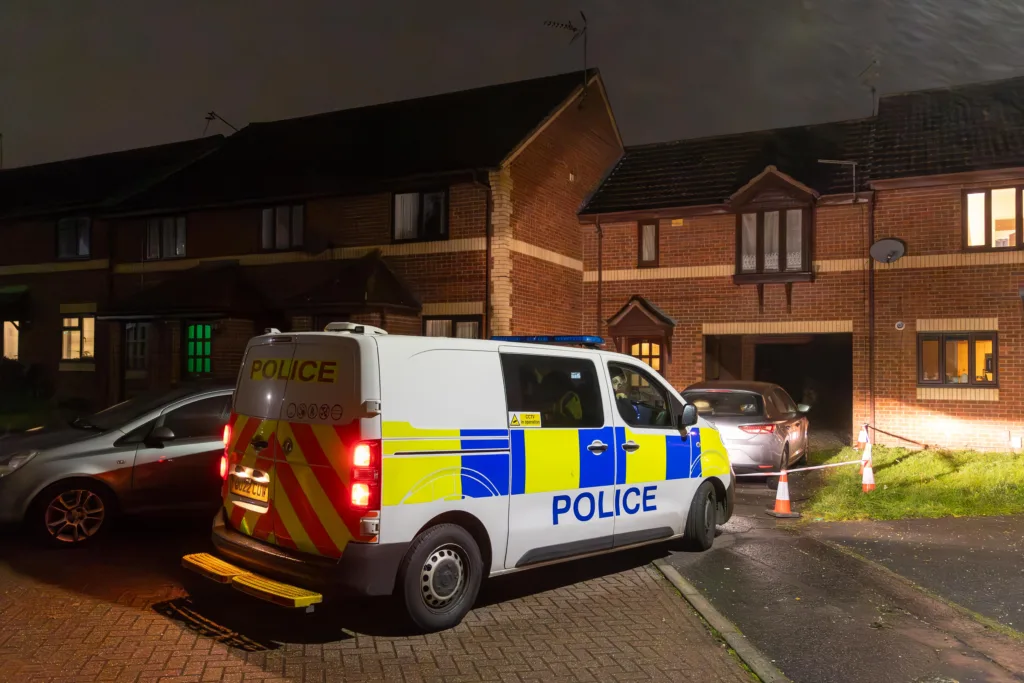 Police discovered the man’s body at a property in Farriers Court, Peterborough, at about 11pm yesterday (19 November). A woman has been arrested on suspicion of murder.  PHOTO: Terry Harris.