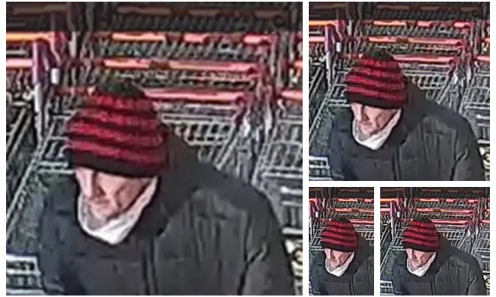 CCTV image of a man police would like to speak to in connection with robbery in Peterborough