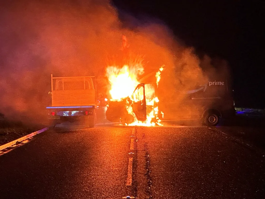 Bus with children on board collides with van that bursts into flames on A47 between Guyhirn and Peterborough