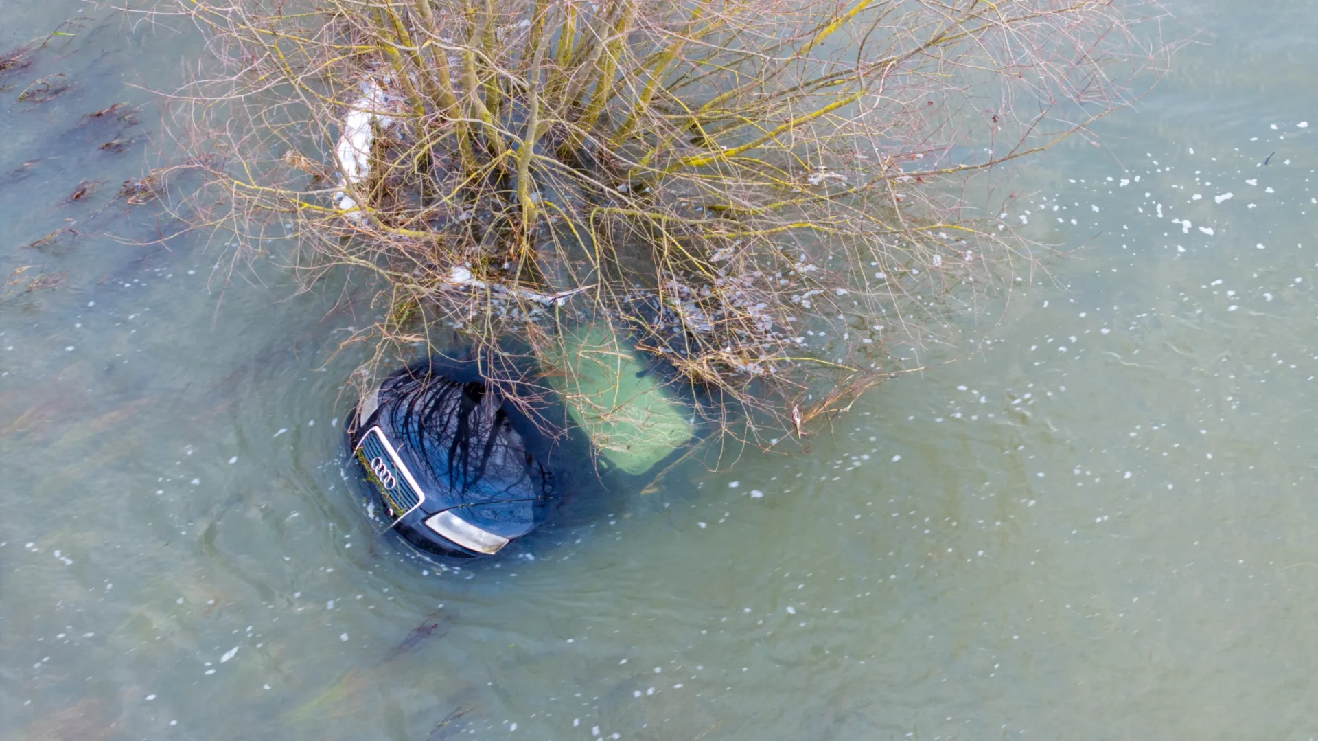 Cars submerged flooded road strong winds - News for Peterborough and Cambridgeshire News for Peterborough and Cambridgeshire - Picture dated December 20th shows an Audi car submerged on the flooded A1101 in Welney; one of two cars spotted floating in the waters. PHOTO: Bav Media