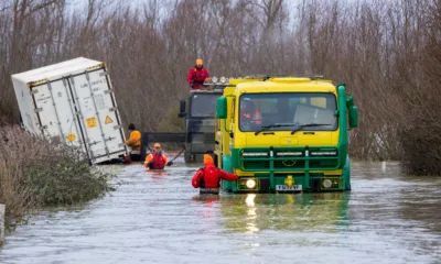 An articulated lorry was finally recovered from a flooded A1101 at Welney in Norfolk today (Thurs) after being stuck in the deep water for four days. PHOTO: Bav Media