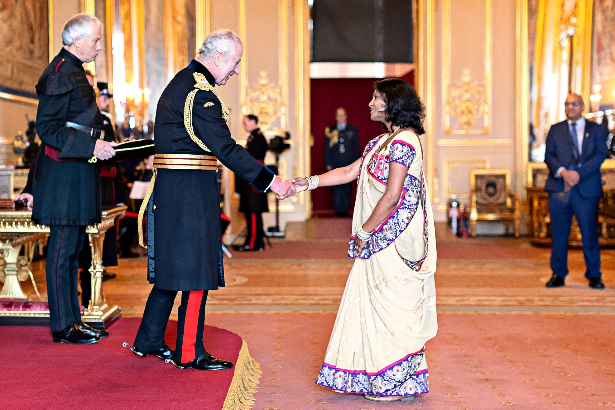 Miss Jyoti Shah MBE attending the investiture at Buckingham Palace with King Charles. She was honoured in the New Year’s Honours list 2022.
