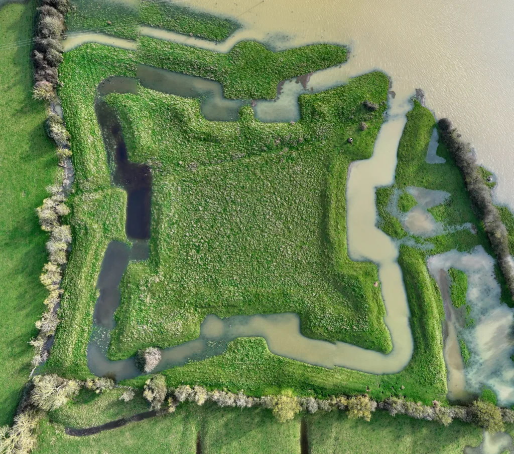 Flooding reveals English Civil War fort after Storm Henk. The clear outline of a 400-year-old English Civil War fort has been highlighted after heavy rain and flooding filled a moat around the earthworks following Storm Henk. Aerial photos show The Earith Bulwark in the Cambridgeshire Fens, which was built around 1643 by Oliver Cromwell's forces to protect crossing points on the local rivers, including the River Great Ouse. Picture by Terry Harris.