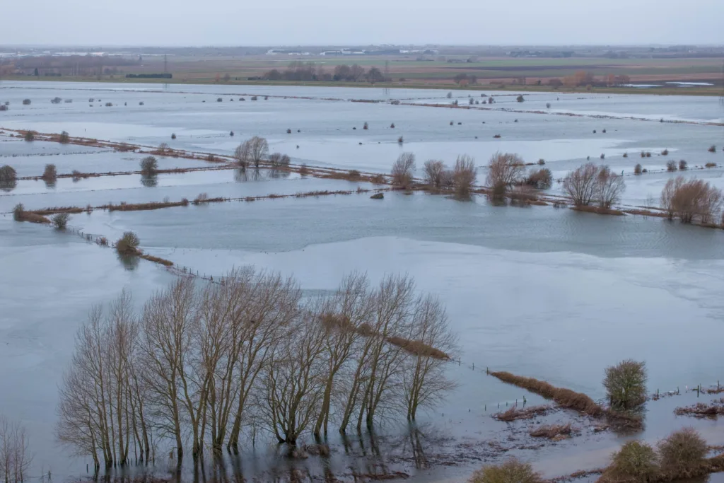Flood water along the B1040 at Whittlesey as Storm Isha begins to batter Britain. The Environment Agency warned today that river levels at Whittlesey remain high “following a previous period of persistent rainfall in the catchment. PHOTO: Terry Harris
