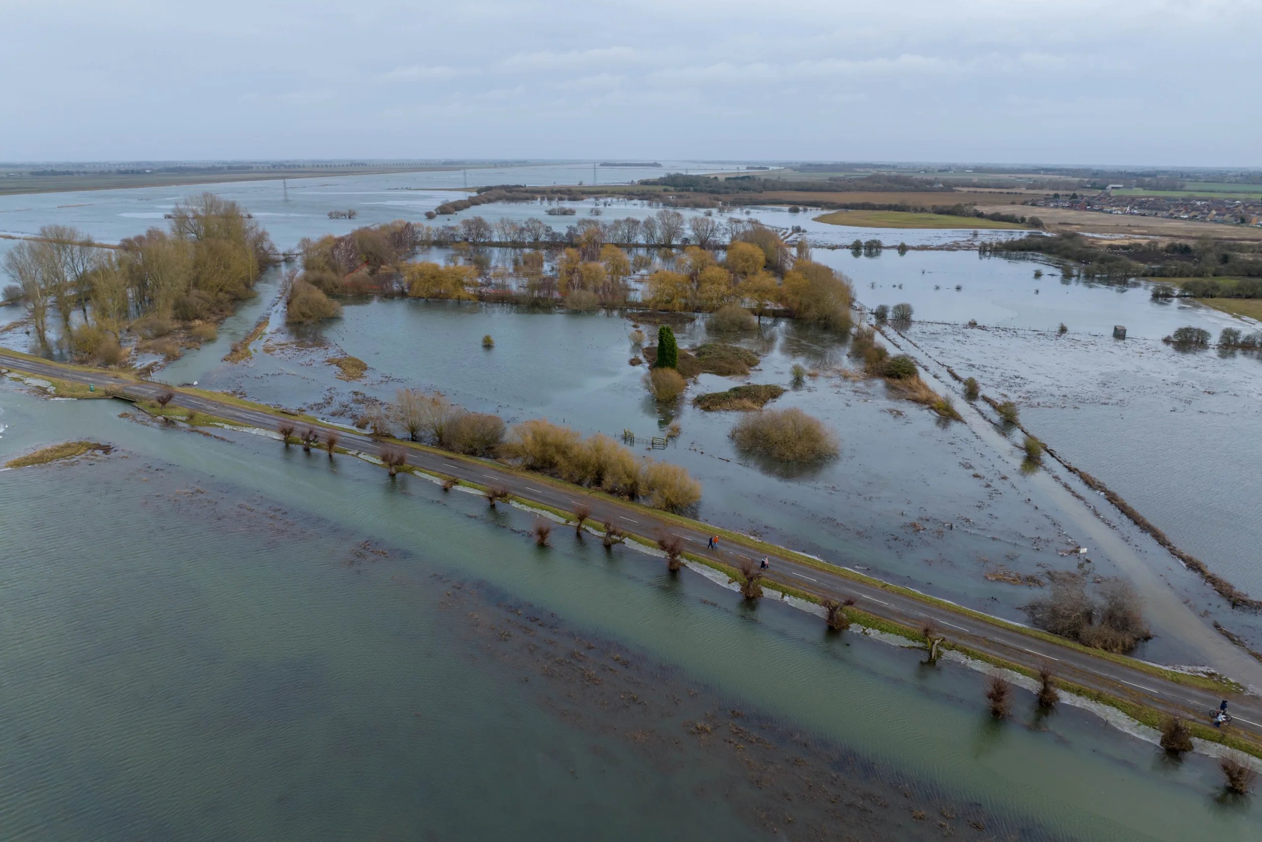 Flood water along the B1040 at Whittlesey as Storm Isha begins to batter Britain. The Environment Agency warned today that river levels at Whittlesey remain high “following a previous period of persistent rainfall in the catchment. PHOTO: Terry Harris