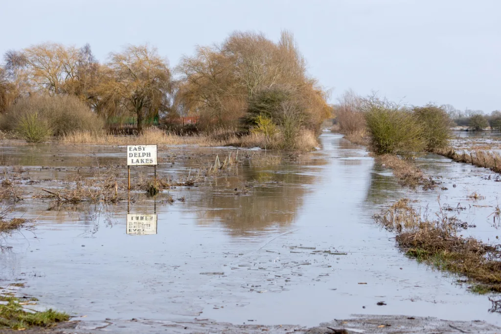 Flood water along the B1040 at Whittlesey as Storm Isha begins to batter Britain. The Environment Agency warned today that river levels at Whittlesey remain high “following a previous period of persistent rainfall in the catchment. PHOTO: Terry Harris
