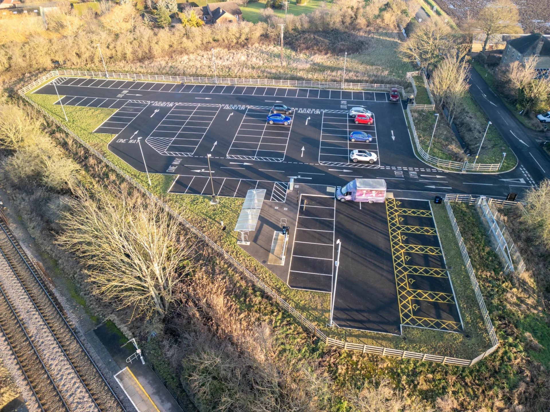 When the 120-space car park at Manea station opened in 2023 — providing free parking with disabled bays, cycle shelter, CCTV, and low-energy lighting — then transport portfolio holder Cllr Chris Seaton described it as part of a deliberate long-term strategy. PHOTO: Terry Harris