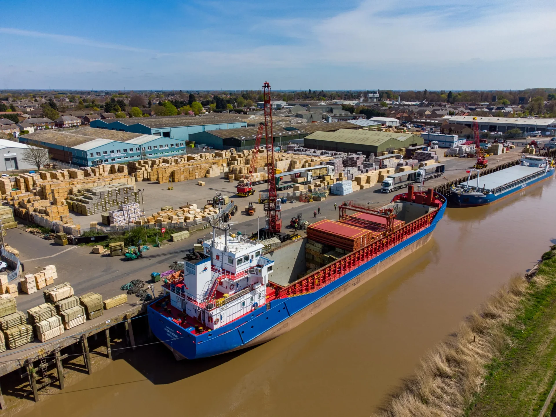 Timber being off-loaded from the Storetbeker (Gibralter) at the Port of Wisbech - News for Peterborough and Cambridgeshire News for Peterborough and Cambridgeshire - Wisbech Port where some charges likely to rise by 25 per cent “in order to begin to reduce the significant deficit being incurred on the port operations”.