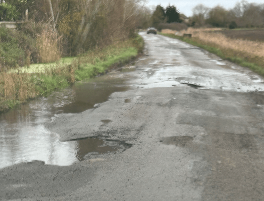 Potholes and flooding along Hook Road, Wimblington 