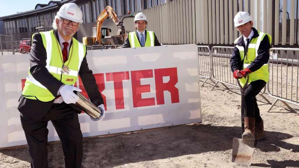 2021 The Chairman of Cambridgeshire County Council, Cllr Mac McGuire marked a moment in time on Thursday 22 April when he buried a time capsule at the council’s new headquarters in Alconbury Weald.