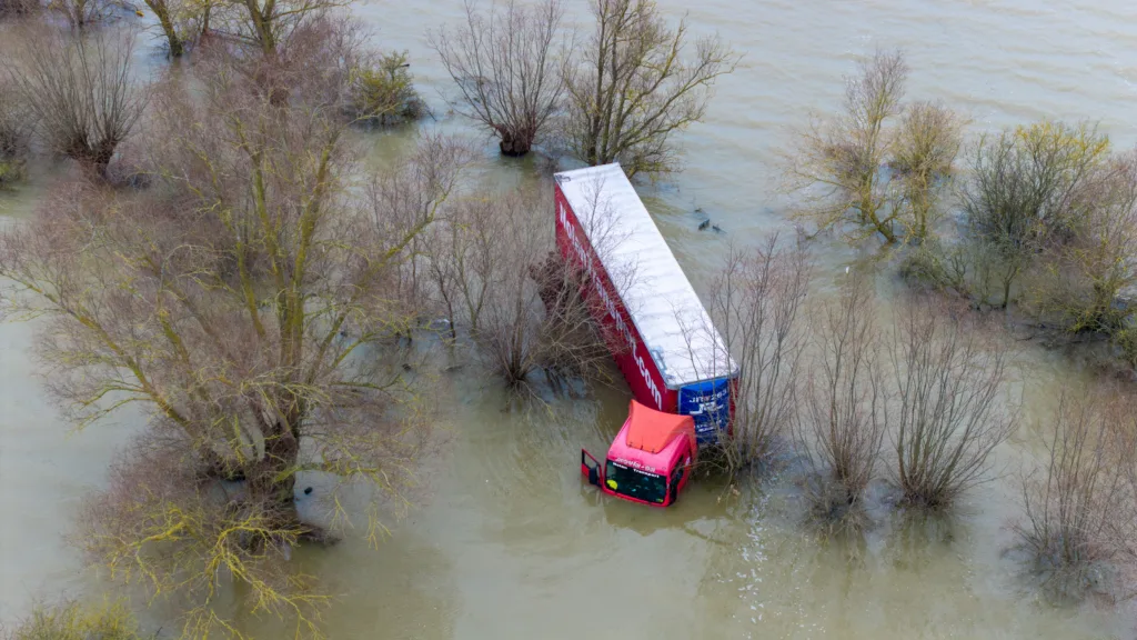 Well and truly stuck: The truck and trailer owned by Nolan Transport that attempted an unsuccessful crossing of Welney Wash road today. PHOTO: Bav Media 