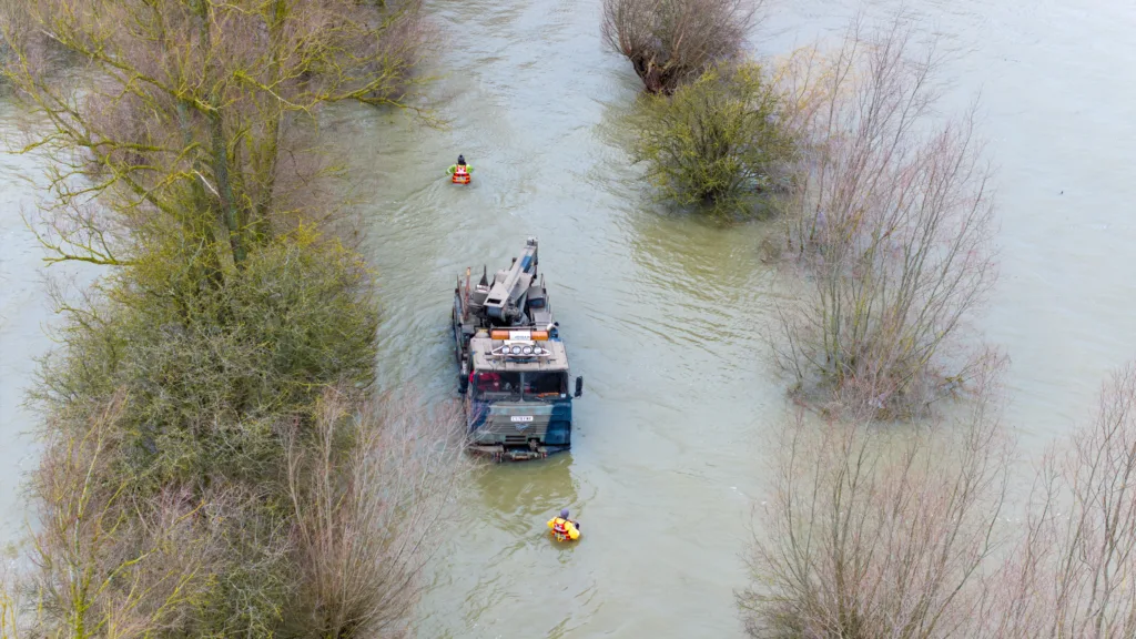 Recovery team from Manchetts were praised for their efforts in retrieving this cab and trailer that the driver was forced to abandon in the early hours of Monday on the flooded A1101 Welney Wash Road. PHOTO: Bav Media 