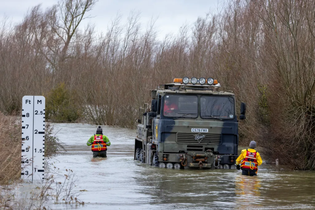 Recovery team from Manchetts were praised for their efforts in retrieving this cab and trailer that the driver was forced to abandon in the early hours of Monday on the flooded A1101 Welney Wash Road. PHOTO: Bav Media 