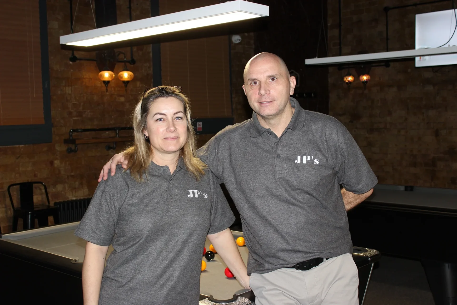 News for Peterborough and Cambridgeshire - Professional snooker player Joe and his partner Penny Richardson on the opening day of Joe Perry’s Snooker and Pool Palace, in Chatteris