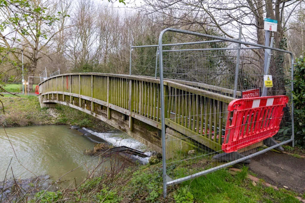 MP Paul Bristow has called for bridges at Cuckoos Hollow, Peterborough, to re-open despite warnings for public safety over their poor condition. 