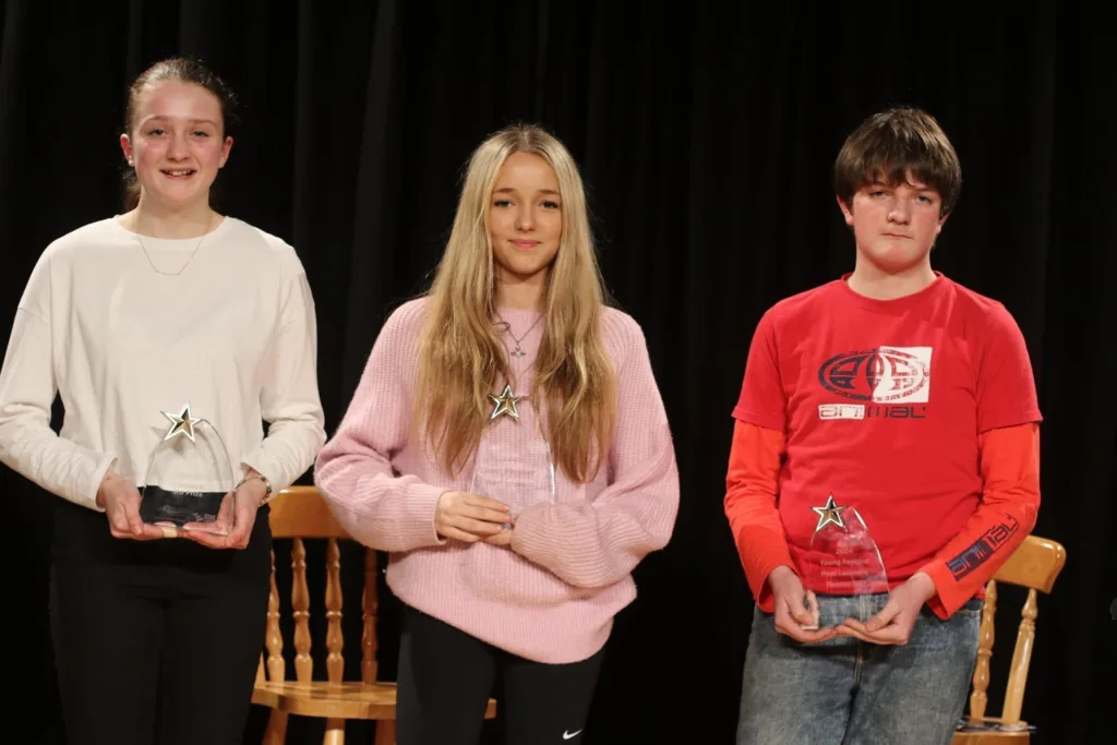 Pictured at the Fenland Poet Laureate awards are Young Fenland Poet Laureate winner Lacey Vinn (centre), with second place runner-up Nathanael Wilson (right) and third place runner-up Lydia Shillings (left). PHOTO: Tim Chapman