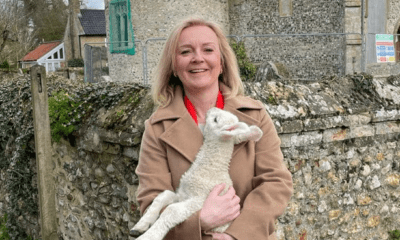 Liz Truss, MP for SW Norfolk, posed outside Beachamwell parish church in her constituency with this lamb in her arms to wish everyone ‘Happy Easter’