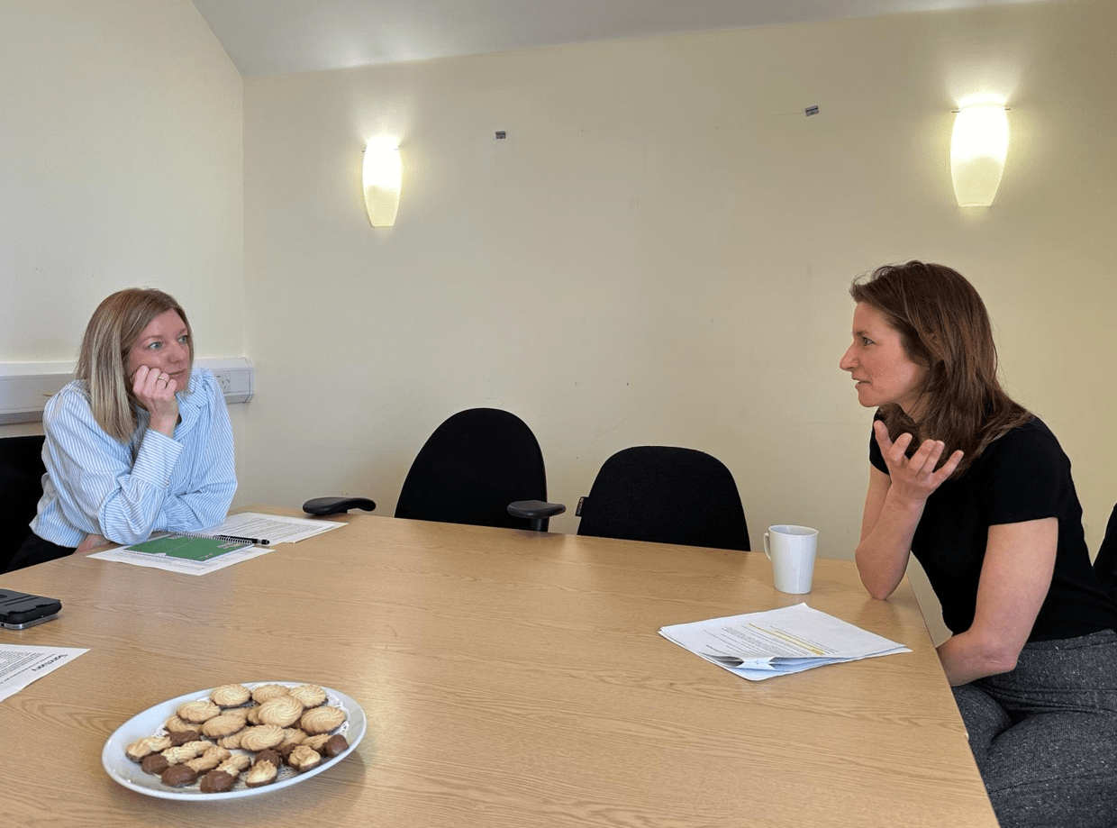 lucy fazer.jpg - News for Peterborough and Cambridgeshire News for Peterborough and Cambridgeshire - Taking the biscuit – MP Lucy Frazer released this photo of her meeting with a Sanctuary Housing Association officer last week.