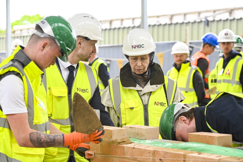 The Princess Royal officially opens the NHBC Training Hub, adjacent to Histon Football Club, Impington, Cambridge; it can train 80 apprentices all year round. PHOTO: NHBC 