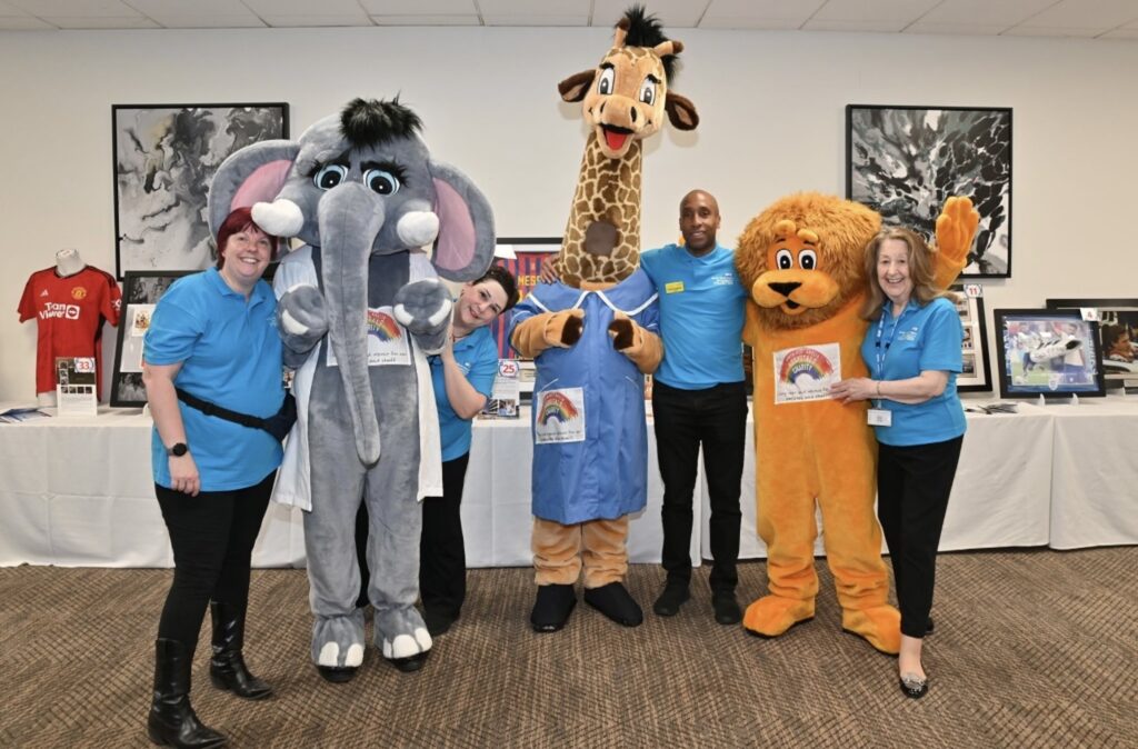 •Some of the NWAFT volunteers with the Hospitals’ Charity mascots.