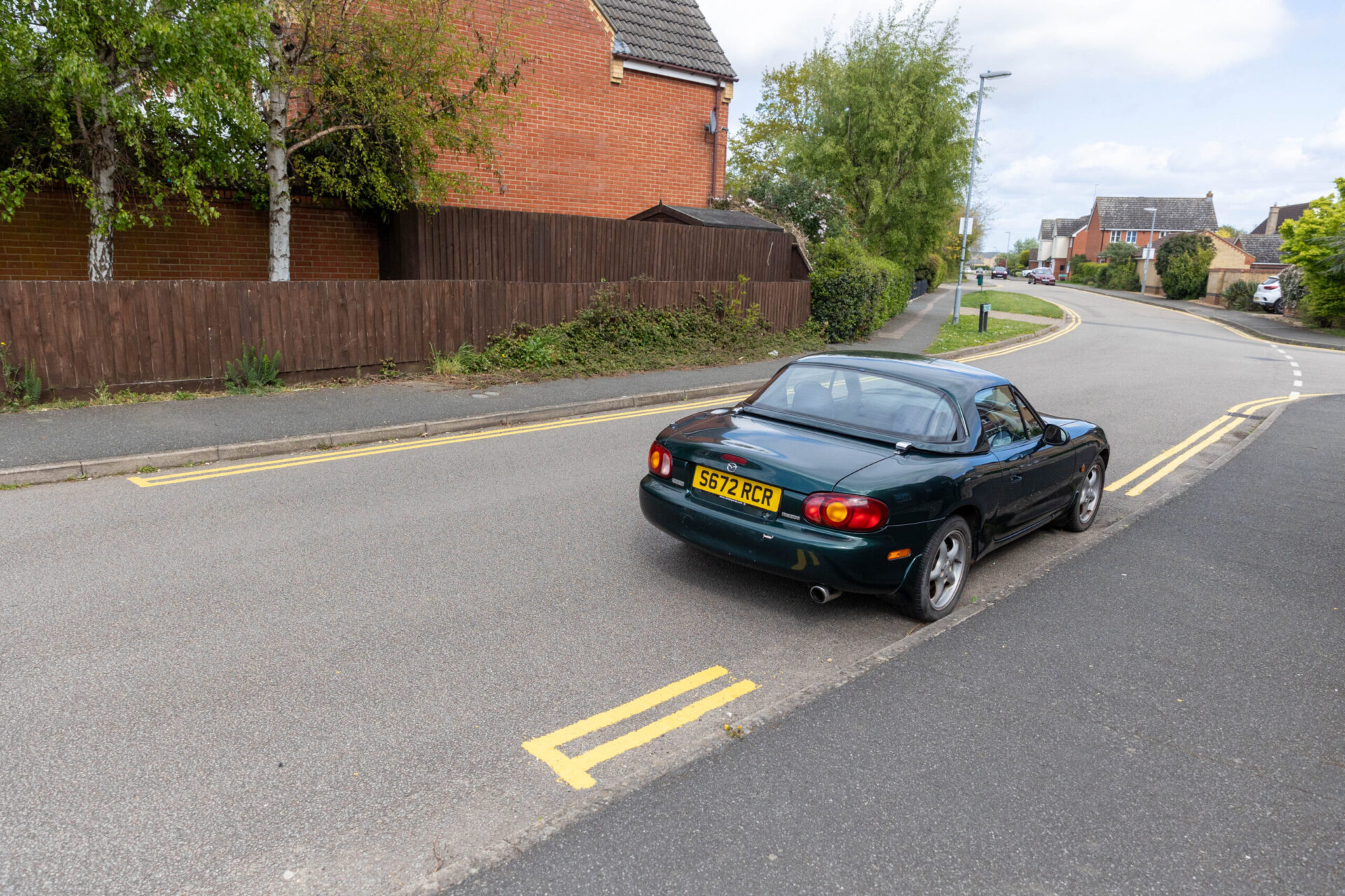 Incomplete double yellow sping up in tiny village. Number of cars per home is a lot… - News for Peterborough and Cambridgeshire News for Peterborough and Cambridgeshire - County council contractors plan a return visit to Witchford near Ely to complete installation of yellow lines. They missed some spots because cars were parked there when they came to carry out the lining. PHOTO: Terry Harris
