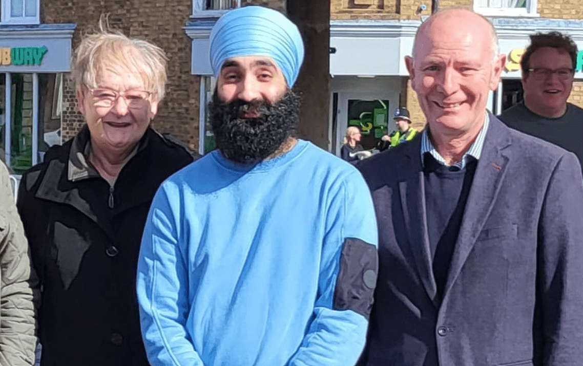 Gurninder Singh Gill (centre) flanked by Whittlesey mayor Cllr Kay Mayor and the Conservative police and crime commissioner candidate Darryl Preston