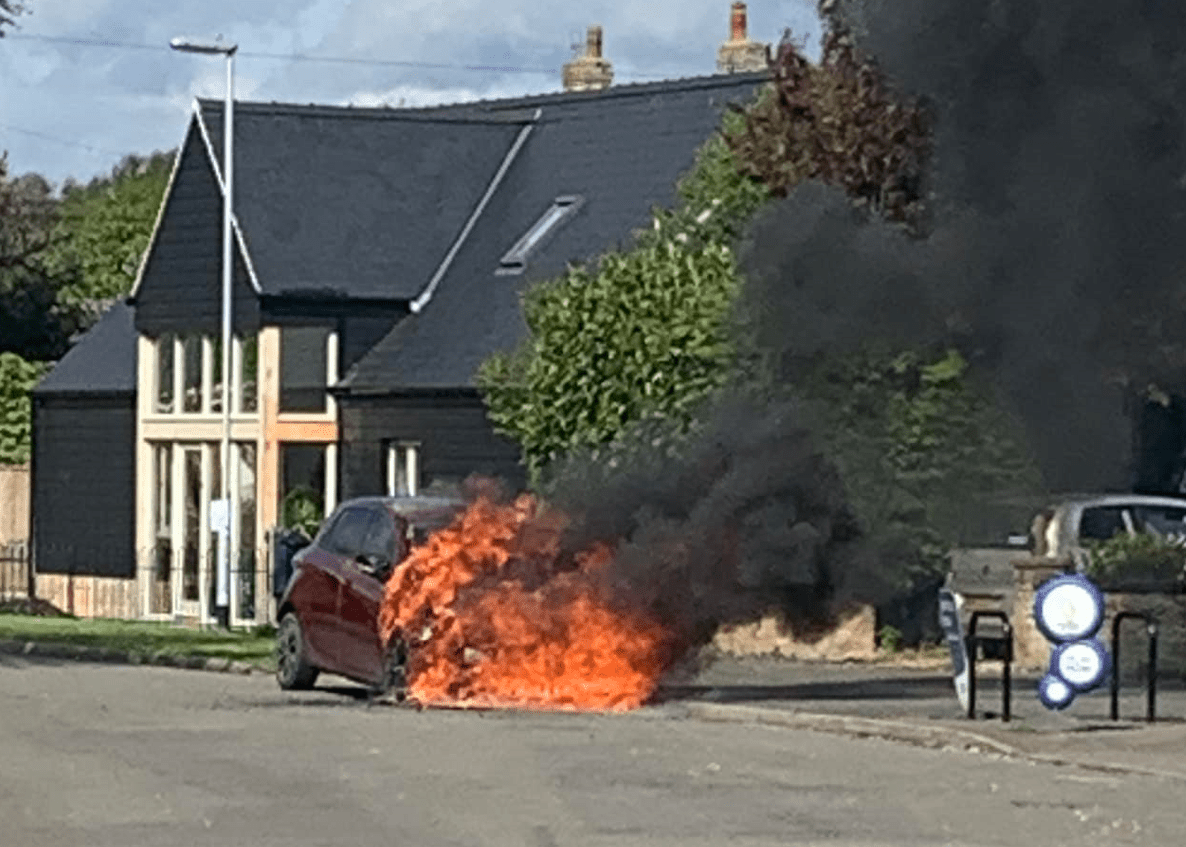 mepal fire 2 - News for Peterborough and Cambridgeshire News for Peterborough and Cambridgeshire - Renault bursts into flames in Mepal High Street. Photo: CambsNews reader