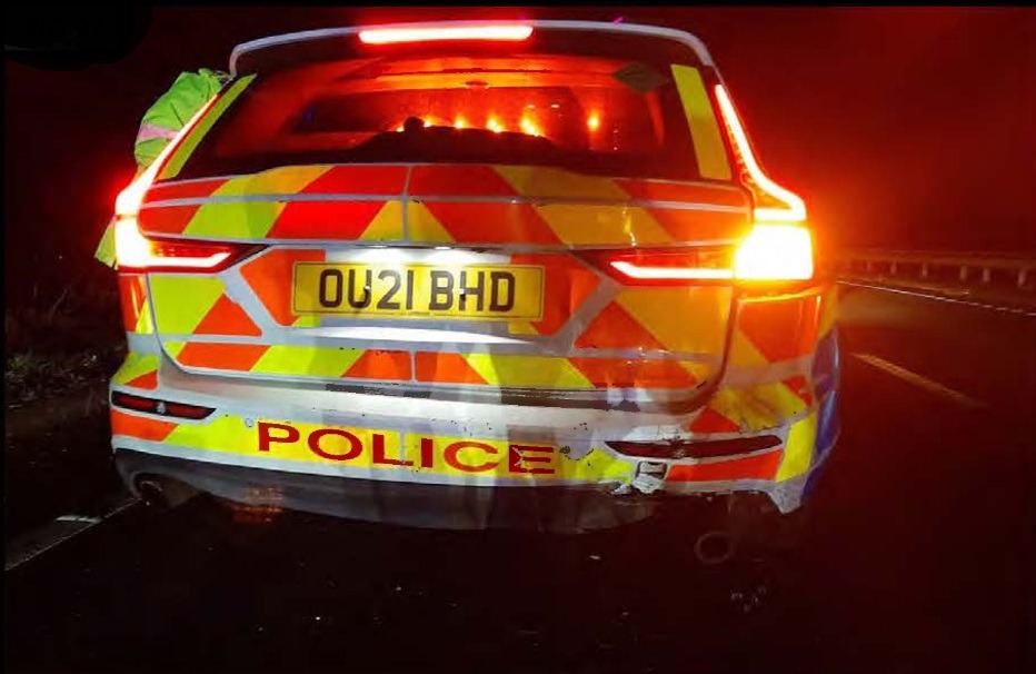 A Kent woman drove into the back of a police car in Cambridgeshire while three times over the drink drive limit