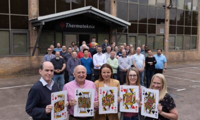 Thermoteknix celebrates a fifth Royal award. Pictured front - from left - Bruce Cairnduff (Engineering Manager), Richard Salisbury (Managing Director and Company Founder), Anna Kwiecień (Purchasing Administrator), Hollie Walsh (Sales Co-Ordinator) and Louise Barton (Office Manager) celebrating their success in securing another Royal award with Thermoteknix staff outside their headquarters in Cambridge, United Kingdom.