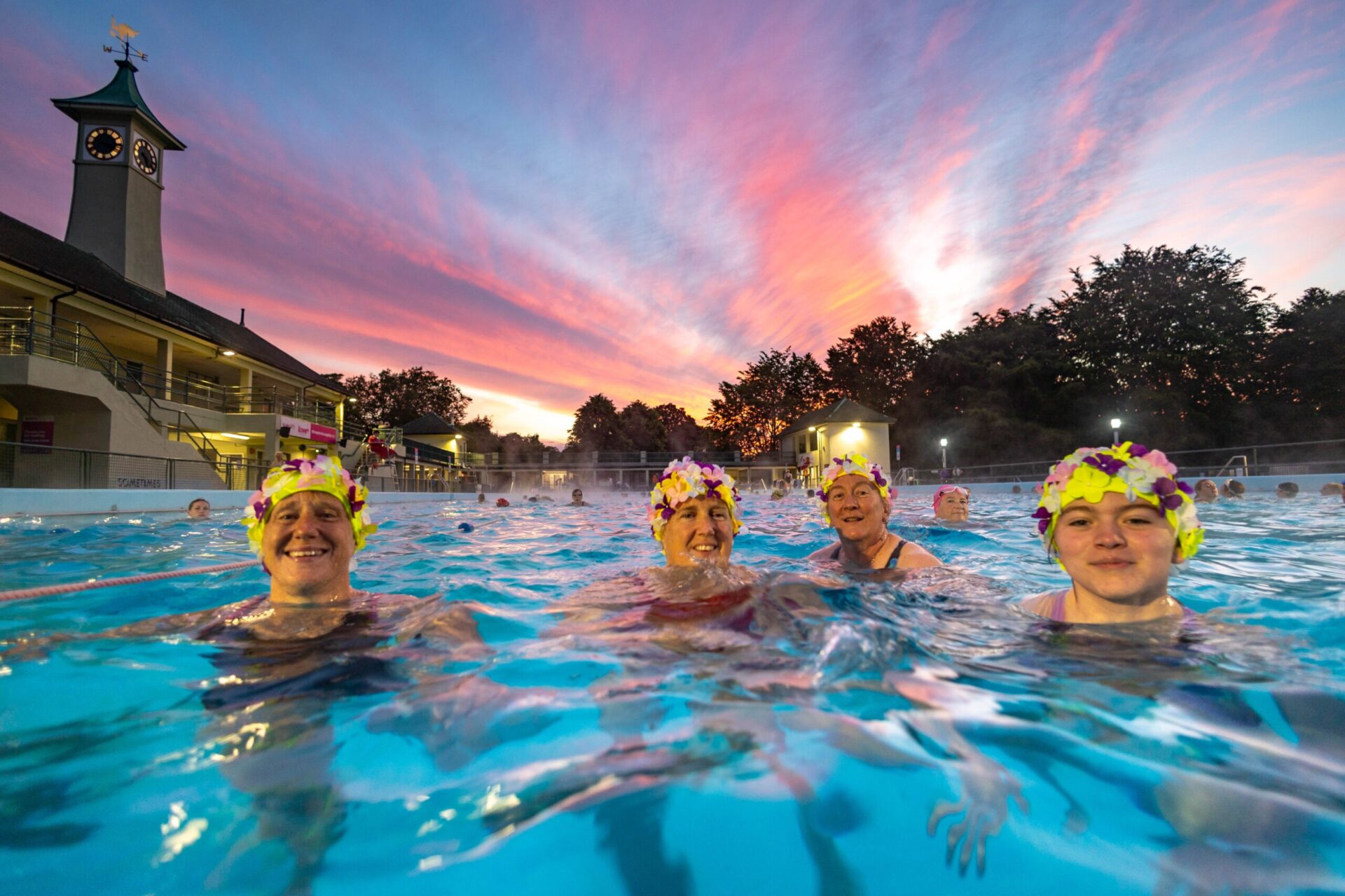 Swimmers take to the Pool at 4am for a sunrise swim on the Summer Solstice. - News for Peterborough and Cambridgeshire News for Peterborough and Cambridgeshire - Swimmers take to the pool at 4am for a sunrise swim on the Summer Solstice. City Lido, Peterborough Thursday 20 June 2024. Mothballing The Lido will save £400,000 says the city council Picture by Terry Harris.