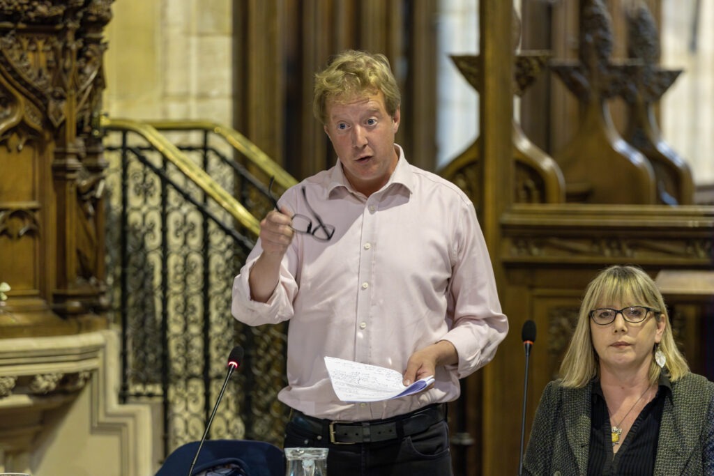 Hustings in St Johns Church. Candidates L2R Paul Bristow (Conservative), Nicola Day (Green Party), Sue Morris (Reform), Andrew Pakes (Labour) and Nick Sandford (Liberal Democrates) - News for Peterborough and Cambridgeshire From day one, Bristow sought to set a tone of urgency and visibility. “Today, I’m ending the war on motorists and making sure public money is spent where it matters,” he declared in his first speech, scrapping a target to cut car miles by 15% by 2030 — a policy he branded “anti-driver.”