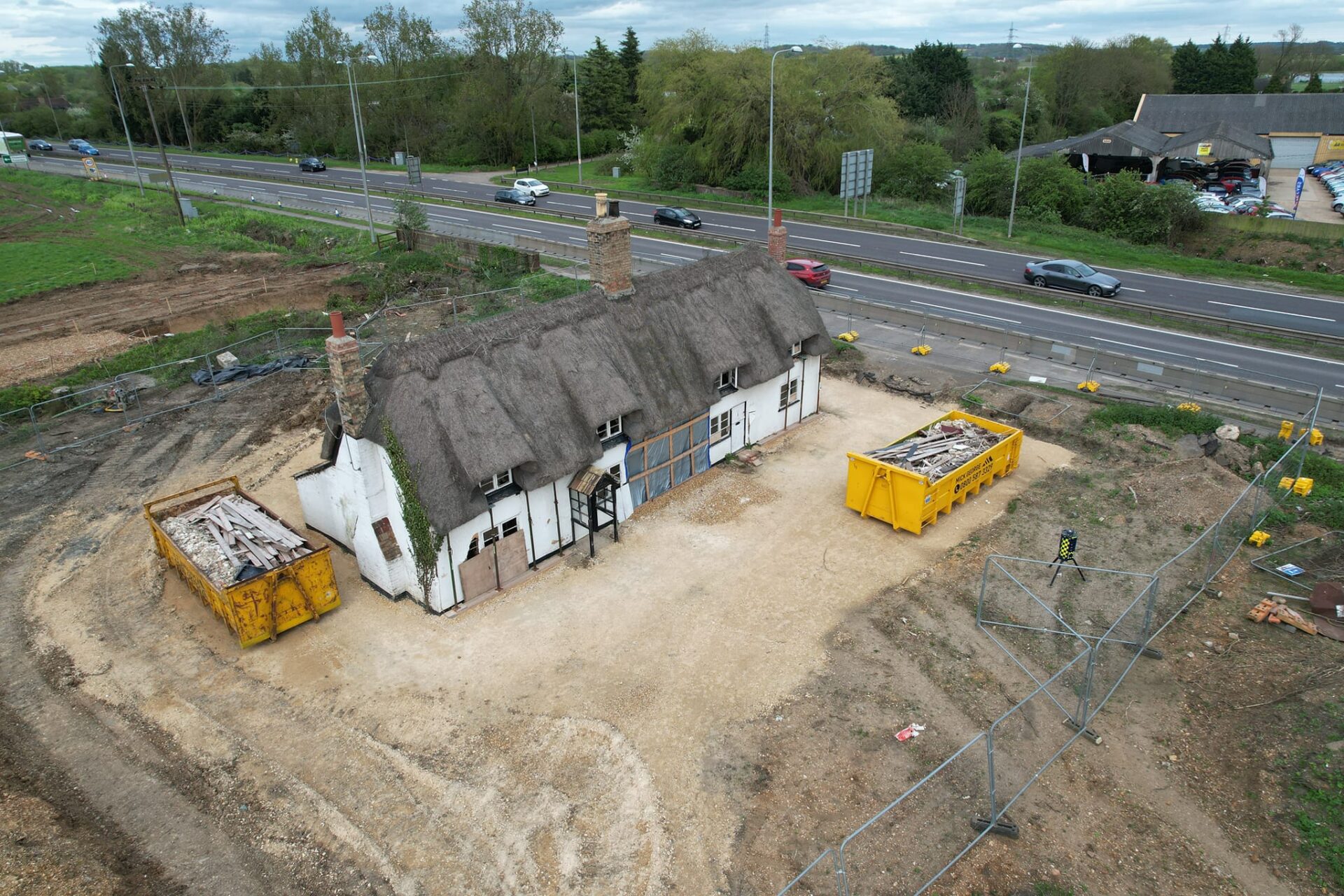 default - News for Peterborough and Cambridgeshire News for Peterborough and Cambridgeshire - Historic Brook Cottages near the Black Cat roundabout just prior to demolition: PHOTO Drone Photos Sandy