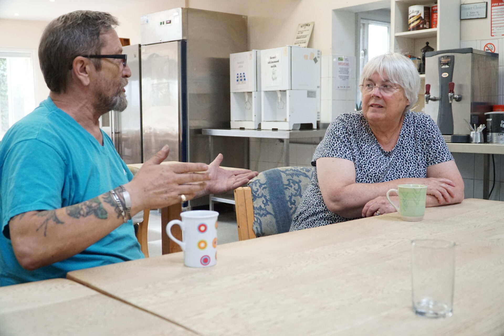 Rob and MP Charlotte Cane (002) - News for Peterborough and Cambridgeshire News for Peterborough and Cambridgeshire - : Pledging support for supported housing – MP Charlotte talks with companion Rob about his experiences at Emmaus Cambridge.