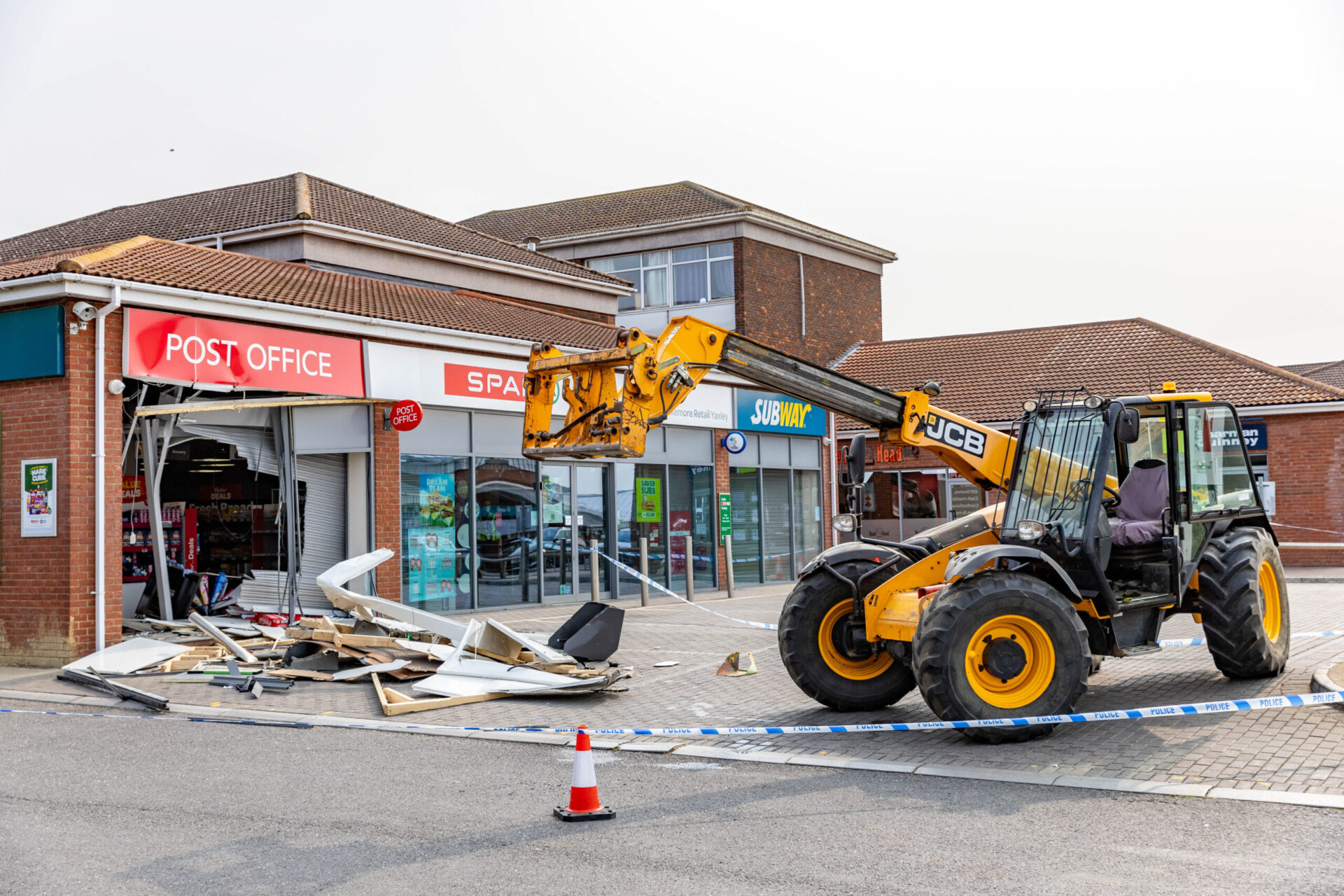 Police investigate a cash machine raid using a JCB Telehandler at local Spa Shop - News for Peterborough and Cambridgeshire News for Peterborough and Cambridgeshire -