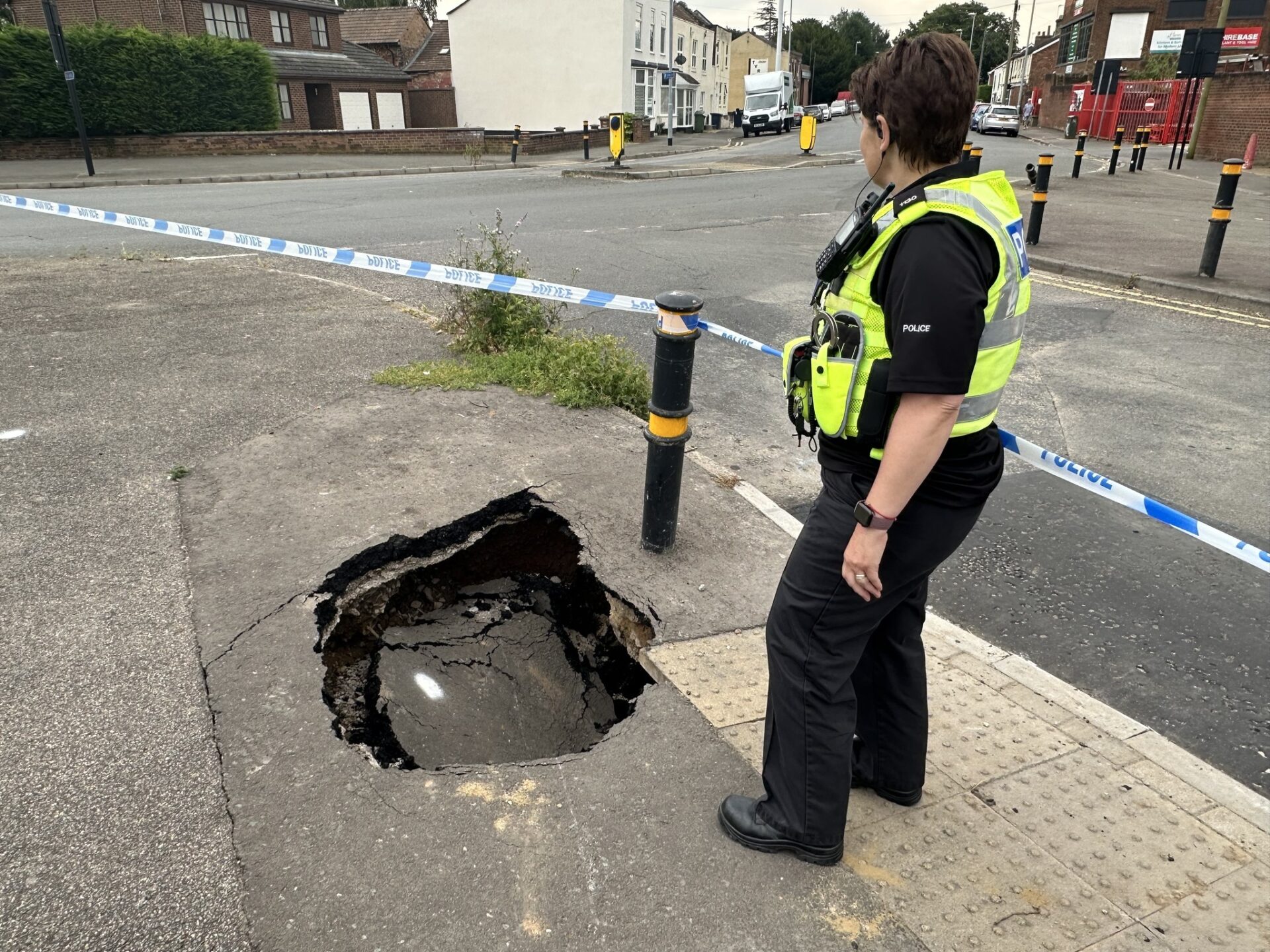 sink 1 - News for Peterborough and Cambridgeshire News for Peterborough and Cambridgeshire - Latest Wisbech sink holes, West Street junction with Elm Road. PHOTO: Policing Fenland