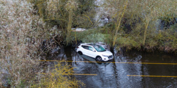 Picture dated October 10th shows the abandoned car on the flooded A1101 in Welney on the Norfolk/Cambs border with the driver having to be rescued on Wednesday evening by the fire service. PHOTO: Bav Media