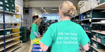 Photo caption: Food being processed inside the Cambridge City Foodbank warehouse