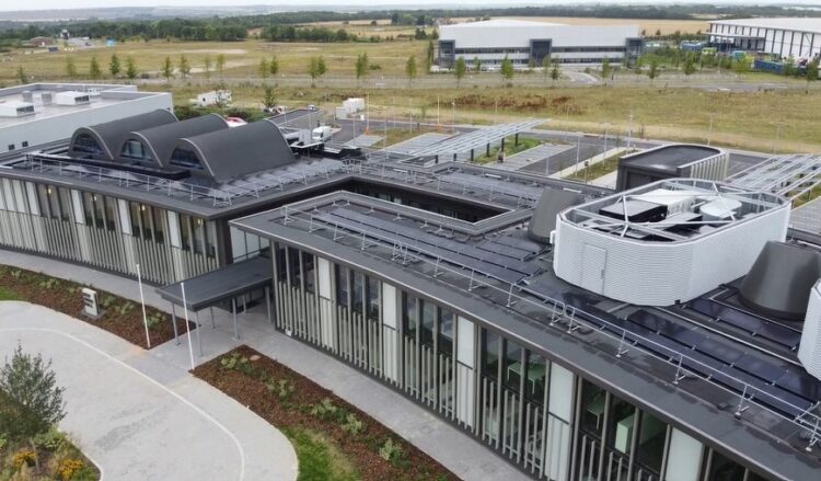 Cambridgeshire County Council is using the new Shire Hall HQ carports as one example of its net zero goal. The solar carports which provide electricity to the building alongside the rooftop solar photovoltaic panels on top of New Shire Hall. The carports power EV charging points. IMAGE: RG Carter