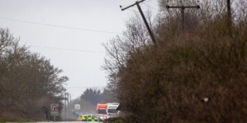 Scene on the A47 near Guyhirn, Cambridgeshire, this morning with UK Power Network on site after power cable came down on tree during Storm Darragh. PHOTO: Terry Harris