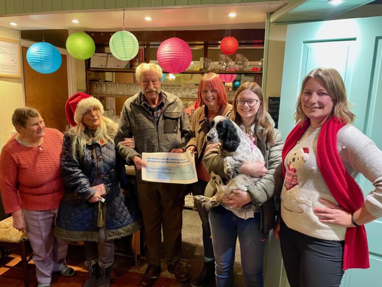 Dec 24 Cheque Ravenswood - News for Peterborough and Cambridgeshire News for Peterborough and Cambridgeshire - Julie Judy and Charlie from Ravenswood Pet Rescue receive their cheque from Club President Fred Clarke, with Club Chairman Sara Fleming and Vice-Chair Janice Willis.