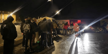 A queue for food at Feed Fenland: On the 8th of February 2025, 7 volunteers from Feed Fenland and Wisbech Street Supplies will sleep on the streets of Wisbech to raise money for the homeless.